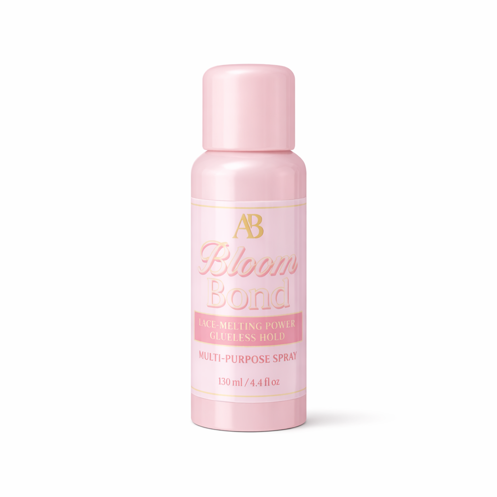 Pink bottle of Bloom Bond multi-purpose spray on a white background